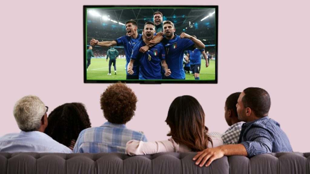 People watching the TV with images of the Euro 2021